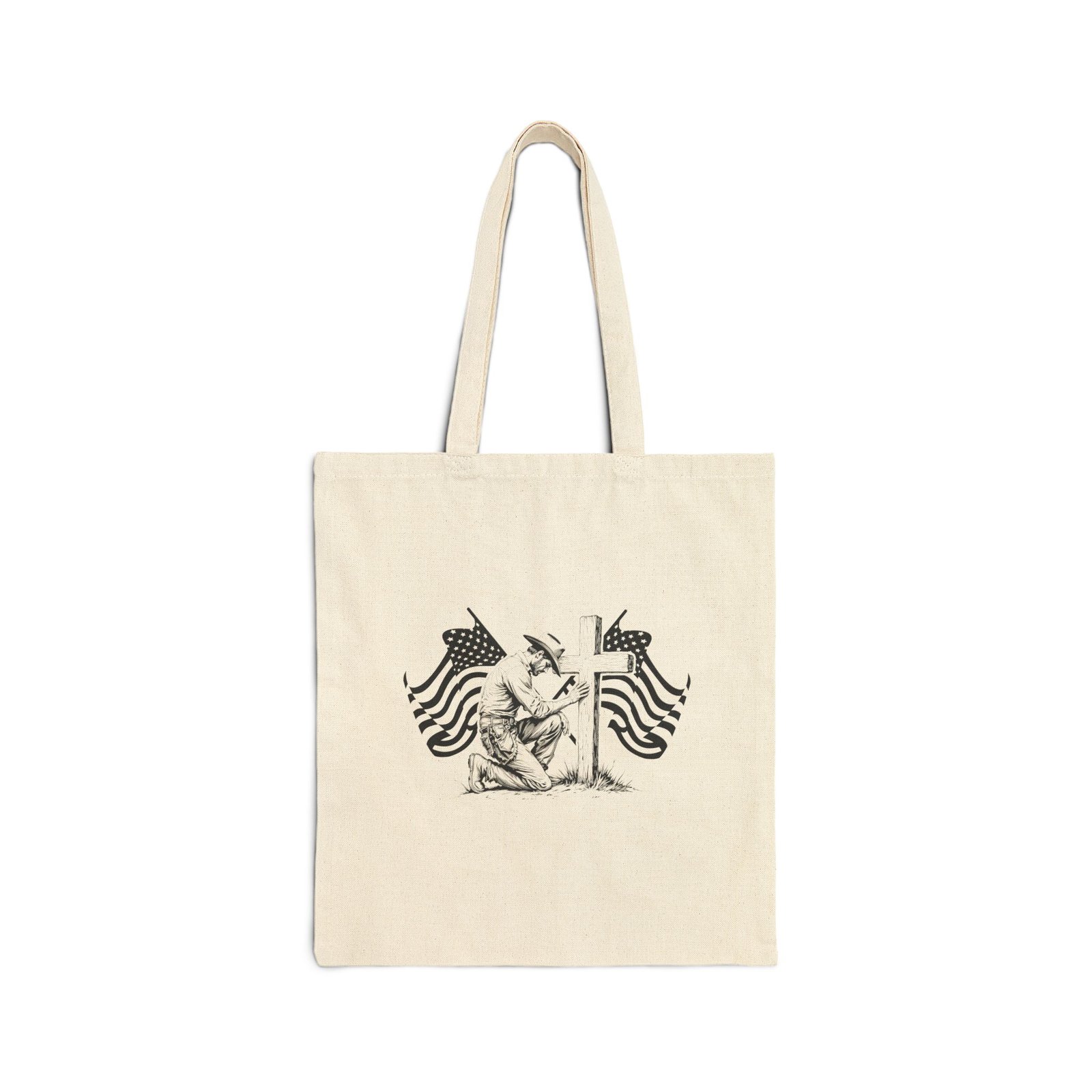 4641367402570551628_2048.jpeg USA Tote Bag – Kneeling Cowboy Patriotic Tote Bag – American Flags & Cross Graphic – Natural Canvas Faith-Based Carryall Gift Durable Eco-Friendly Shopping Bag - Image 1
